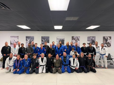Adult Gi Jiu-Jitsu team photo with students of every belt rank at Gustavo Machado BJJ Venice